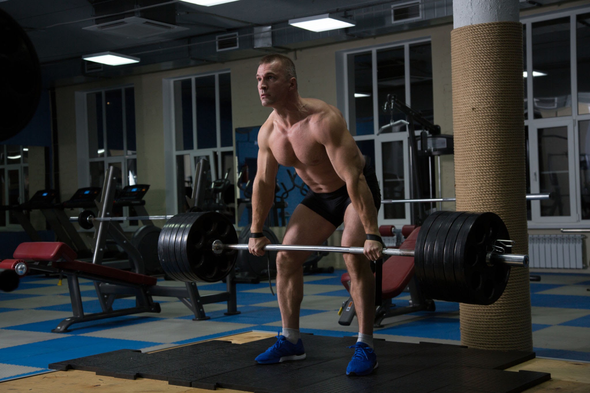 Sports background. athlete getting ready for weight lifting training.